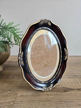 Vintage Victorian style oval ornate picture frame with stand.